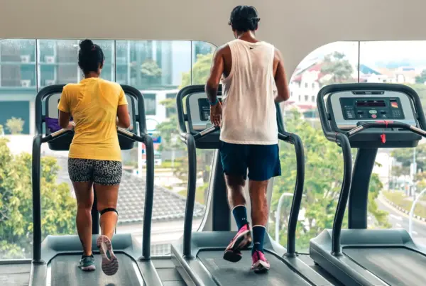 2 individuals running on a treadmill at GoFit Changi