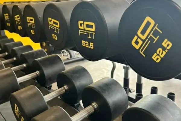 A Close-up of Heavy Dumbbells | How Personal Training Accelerates Fat Loss