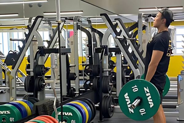 Man lighting a barbell with weights